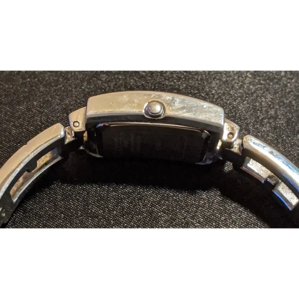 Guess Women's Quartz Watch Silver Dial Crystals Stainless Steel Bracelet G85458L
